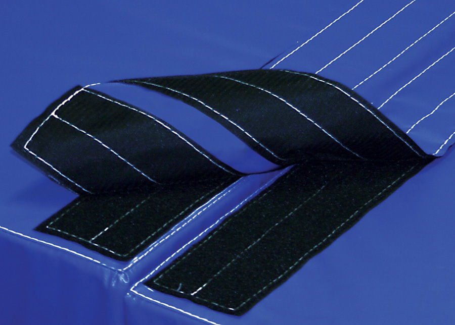 Attaching system for competition landing mat